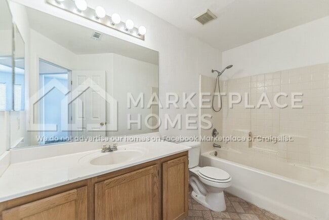 Building Photo - 9021 Iron Hitch Ave