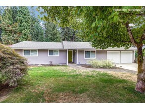 Building Photo - Spacious 4-Bedroom Home with Multiple Livi...