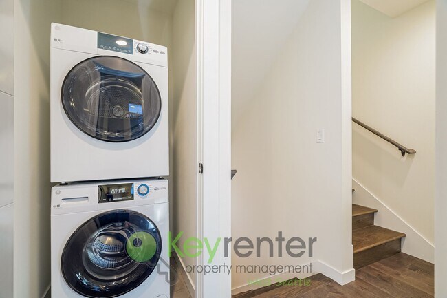 Building Photo - Rooftop Living with Open Concept Design and Parking Included