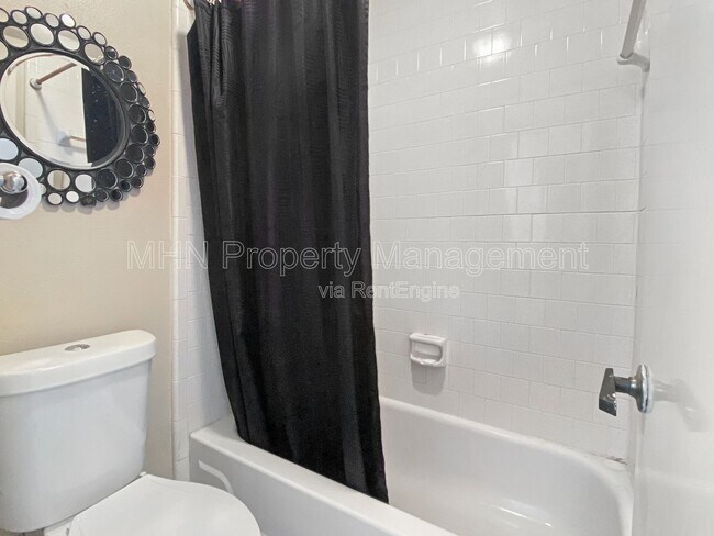 Building Photo - 9609 Woodland Hills