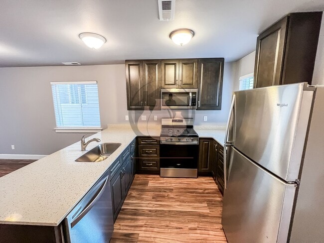 Building Photo - Charming Newer Construction Townhome-Move ...