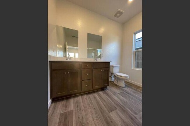 Building Photo - Move-In Special: $500 Off & Solar Savings in This Charming 4-Bedroom Home!