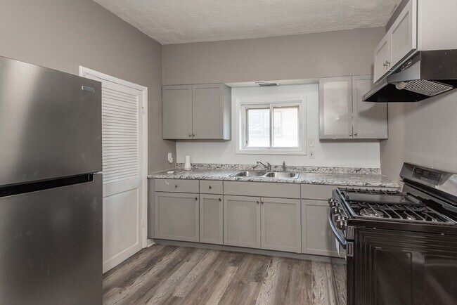 Building Photo - 8819 North Ave