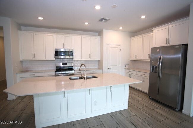 Building Photo - 9127 W Minnezona Ave