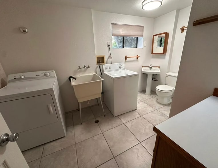 laundry room adn additional bathroom with shower - 2129 NW 201st St