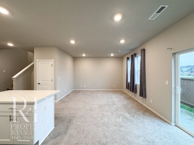 Building Photo - Light-Filled Newer Bremerton Home with Loft, Fenced Yard & 2-Car Garage