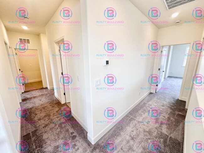 Building Photo - Modern Elegance: Stunning  New 4-Bedroom Home with Chef’s Kitchen & Dual Living Spaces