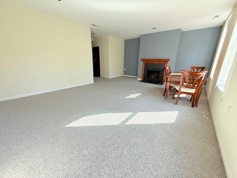 Living room with working wood fireplace - 1331 Vermont Ave NW