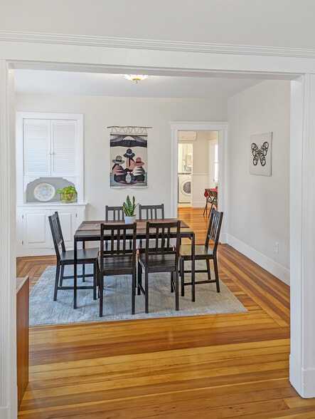 Dining room into kitchen with south-facing windows - 22 Reed St