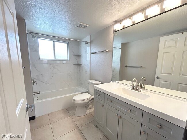 Building Photo - 8284 Key Royal Cir