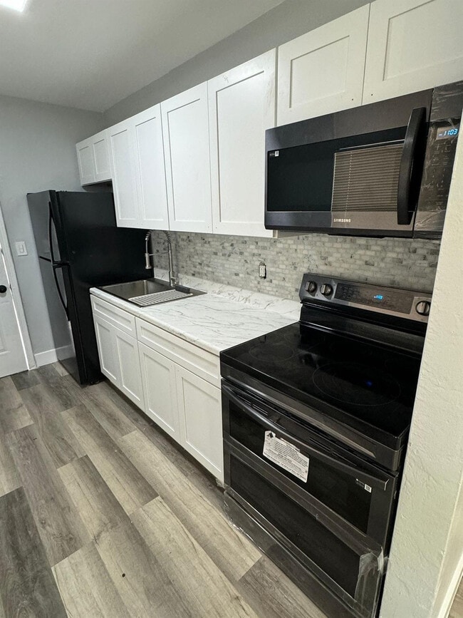 Building Photo - 1501 N Andrews Ave