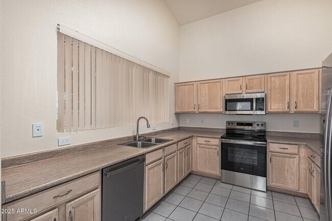 Building Photo - 9069 W Behrend Dr