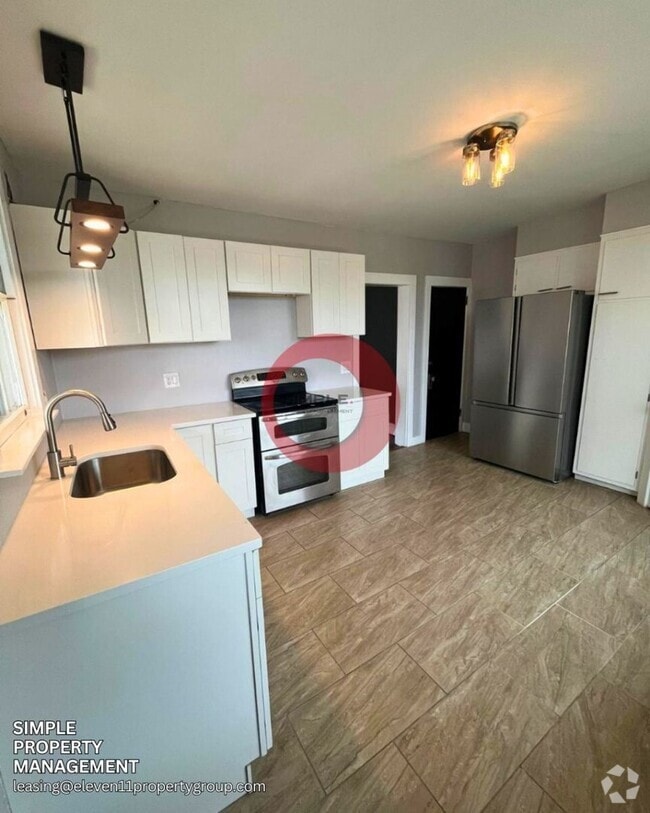 Building Photo - Four-bedroom 1.5 bath with Off street parking