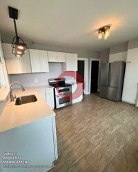 Building Photo - Four-bedroom 1.5 bath with Off street parking