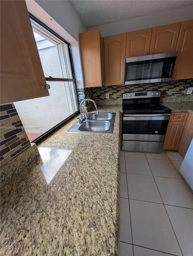 Building Photo - 6551 NW 170th Terrace