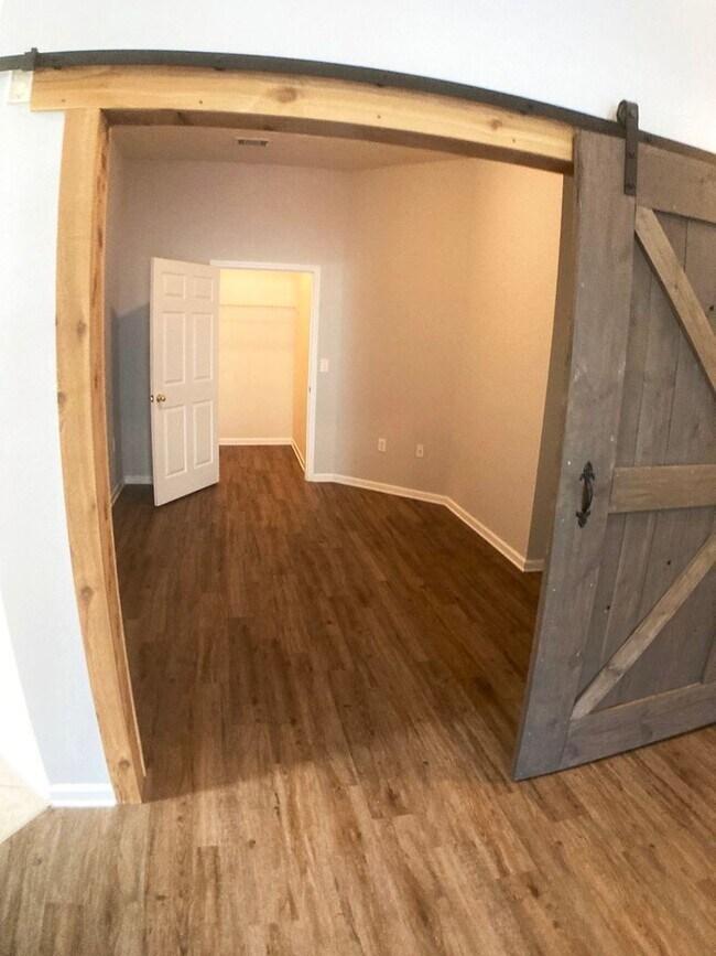 Building Photo - Spacious 3-Bedroom Condo with Pond Views &...