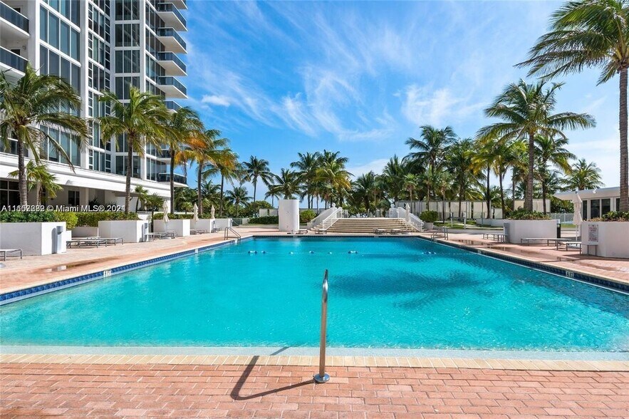 Building Photo - 10275 Collins Ave