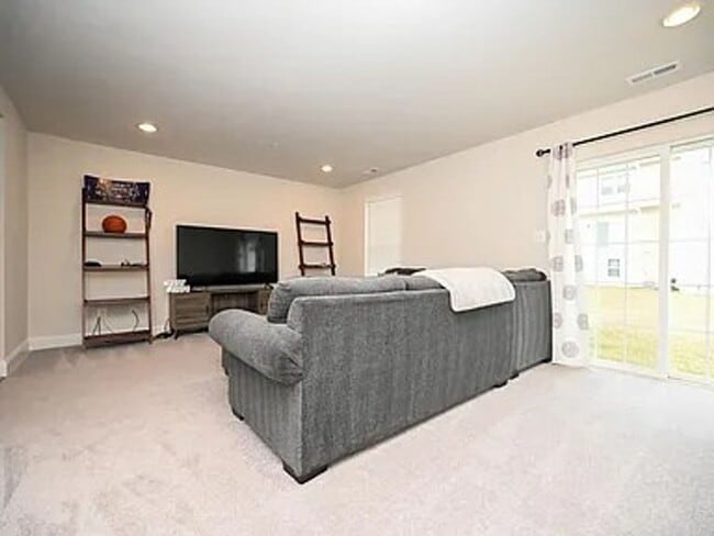 Building Photo - Stunning 3-Story Brick-Front Townhome | Modern Living + Military & First Responder Discount