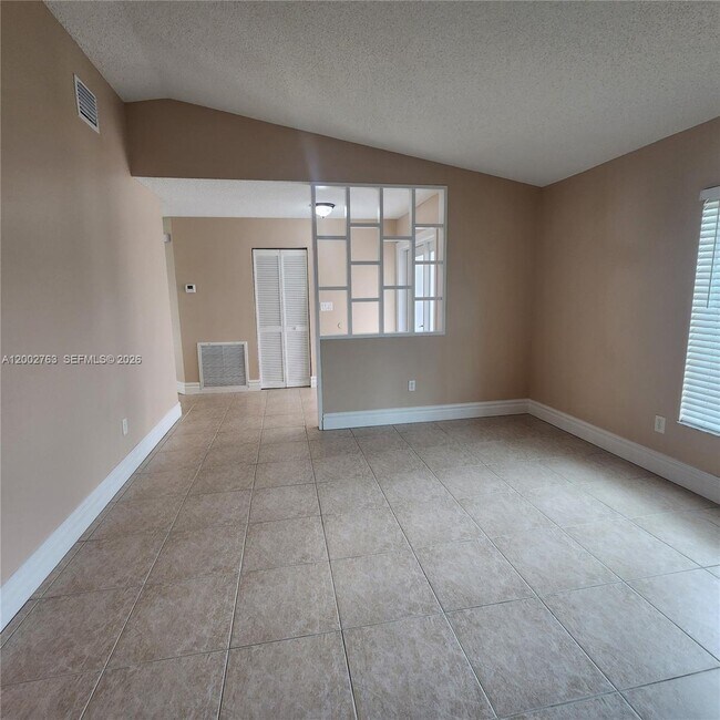 Building Photo - 11950 SW 49th Ct