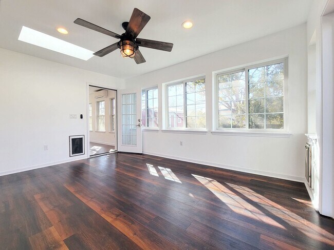 Building Photo - Spacious 4/BR 2.5/BA Two-Story Home with Fireplace & Huge Fenced Yard