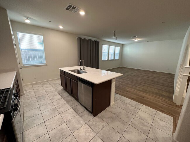Building Photo - Stunning 4 Bedroom, 3 Bath Gated Community W/ Solar