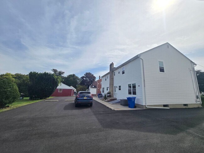 Building Photo - Updates abound at this SPACIOUS, half duplex with 3+ off-street parking spots, 3-bedrooms and 2 f...