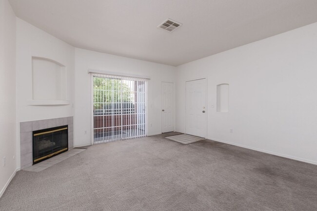 Building Photo - Two bedroom unit in gated NE community with pool