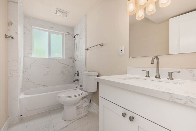 Building Photo - Updated Split-Level Home with Flexible Living Spaces & Backyard Deck