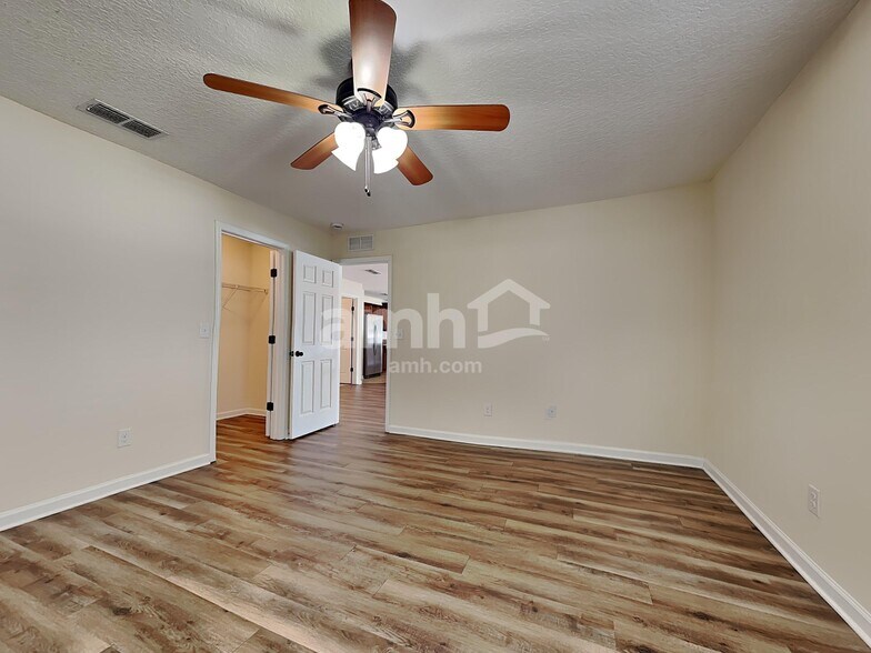 Building Photo - 7344 Rapid River Dr E