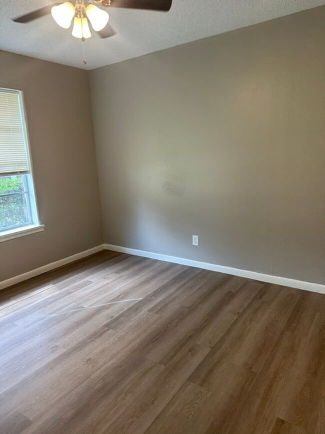 Building Photo - 4/1.5 PTISD Fenced yard and pet friendly