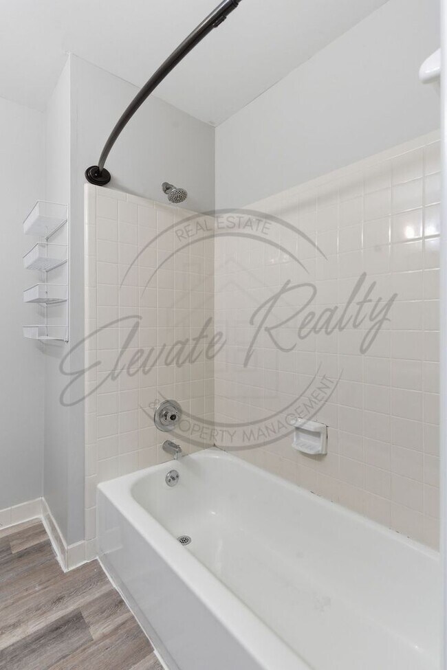 Building Photo - SPRING SPECIAL!! FIRST MONTH FREE on this Two Bedroom Condo, Garden Level with Washer/Dryer Hook ...