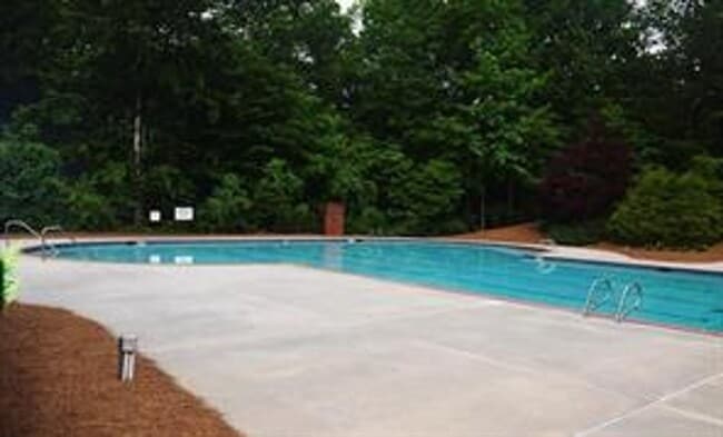 Building Photo - Gorgeous 3-Story Brick Home / 2 Fireplaces / Full Finished Basement / Chapel Hill Schools