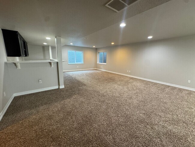 Building Photo - Spacious 5-Bedroom Ranch with Finished Basement, Wet Bar & 3-Car Garage
