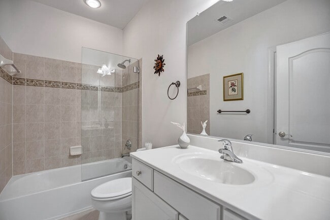 Building Photo - Stunning 4BR All-Brick End-Unit Townhome with Rooftop Terrace in Potomac Greens