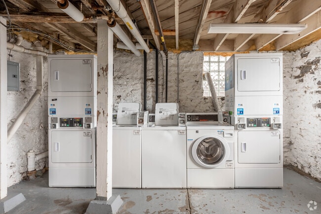 Onsite Laundry Facility - The Triad Apartments