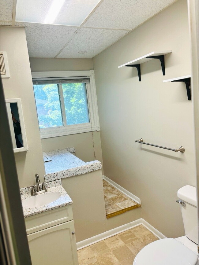 Building Photo - "Charming Saginaw Duplex: Spacious 2-Bedroom Haven with Gleaming Hardwood Floors!"