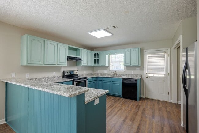 Building Photo - Inviting 3BR Home with Open Split Floor Plan, Fenced Yard & Covered Porches in Northlake