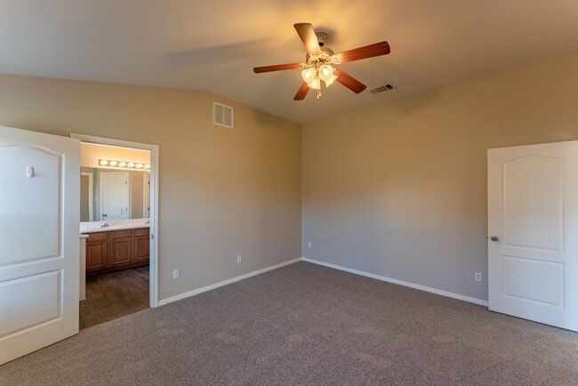 Building Photo - Charming Brick Home with Open Floorplan, Vaulted Ceilings, and Luxurious Amenities—Perfect for An...