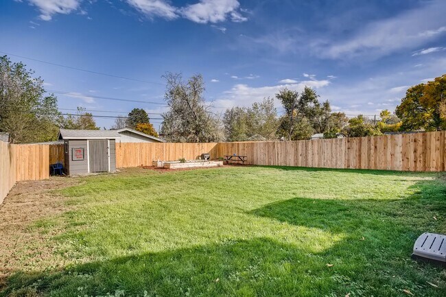 Building Photo - Updated Edgewater Home with Backyard Oasis