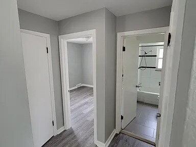 Building Photo - Beautiful Mid-Century home completely updated with two first-floor bedrooms, a spacious second-fl...