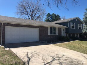 Building Photo - $0 DEPOSIT OPTION. SPACIOUS TRI-LEVEL HOME...
