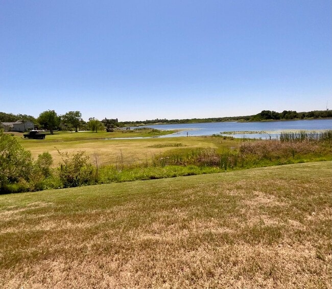 Building Photo - 3 Bedroom 2.5 Bath Cinnamon Bay Home with Stunning view, and Hardwood Flooring!
