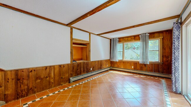 Building Photo - Spacious 3-Bedroom Split-Level with Firepl...