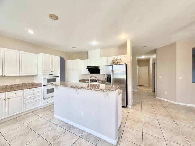 Building Photo - GATED SUMMERLIN HOME | 5 BEDROOM + DOWNSTAIRS DEN | 3-CAR GARAGE