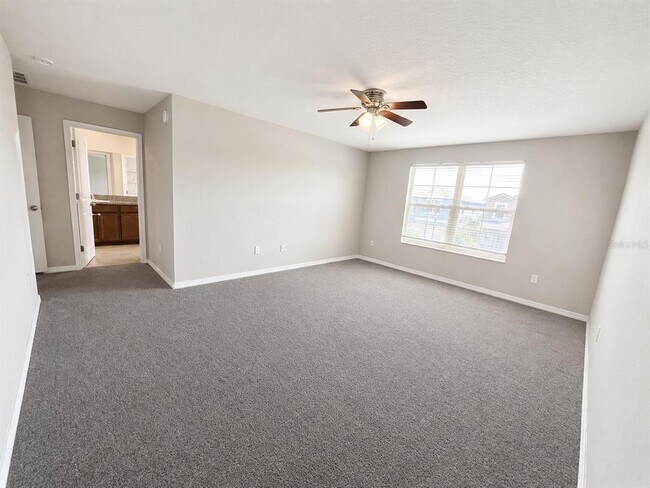 Building Photo - 7406 Rosy Periwinkle Ct