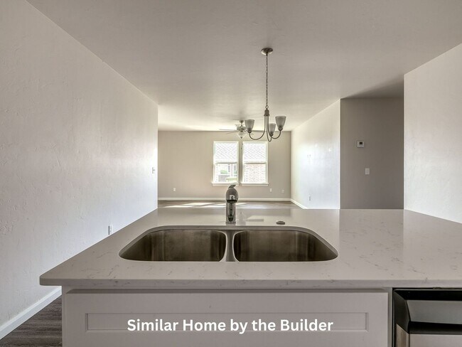 Building Photo - Charming 3-Bed in Yukon - Move-In Ready