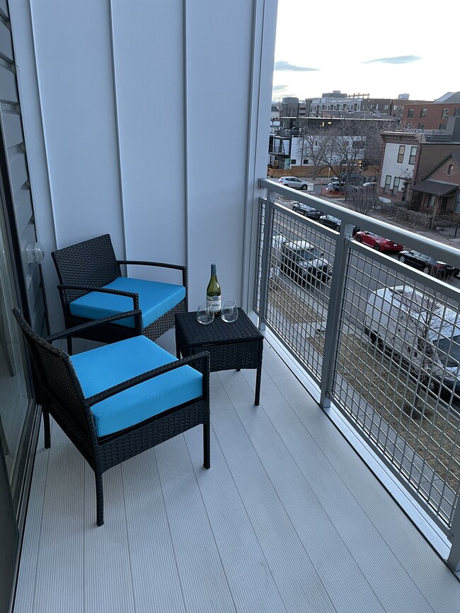 Large, private balcony with sitting area for great views and people watching! - 2530 Lawrence St