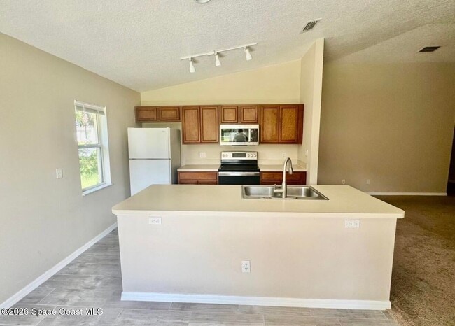 Building Photo - 1072 Flintlock Ave SE