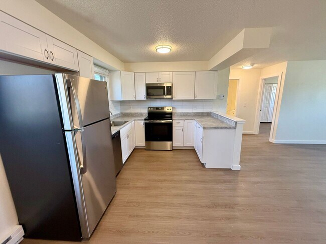 Building Photo - 4950-4956 Basswood Drive