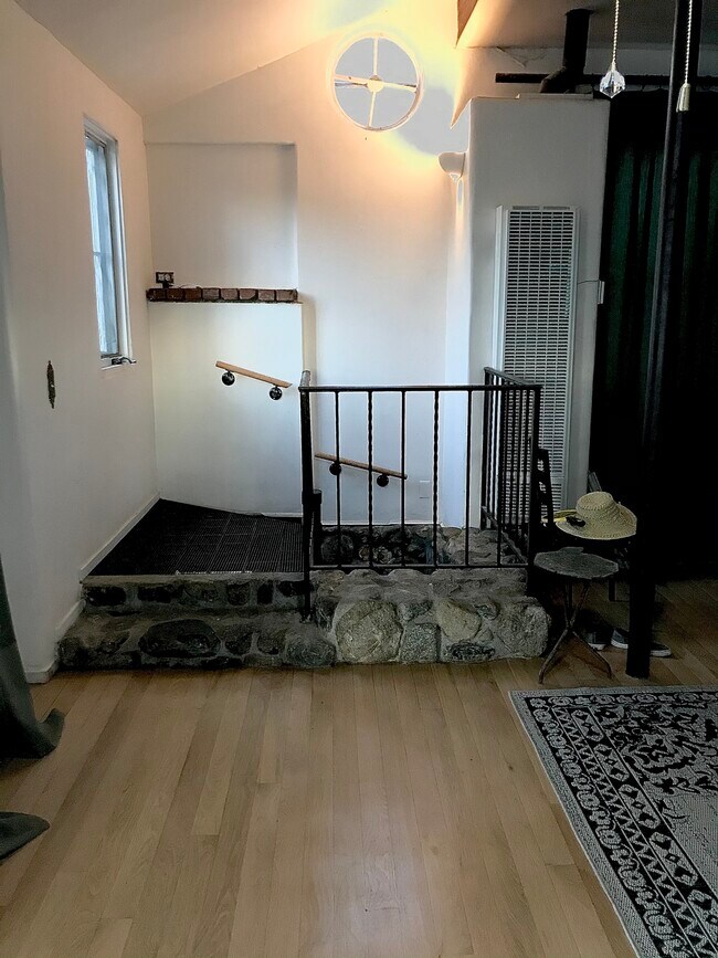 Living room- stairs from kitchen - 7964 Glenties Ln